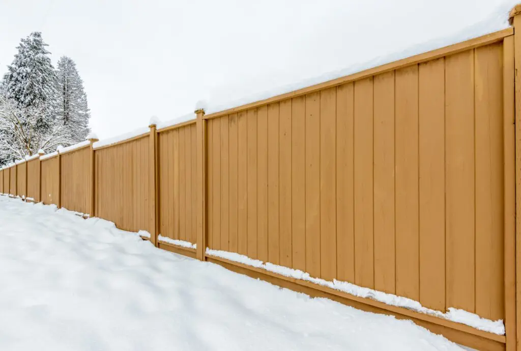 Vinyl fence covered in Indianapolis snow