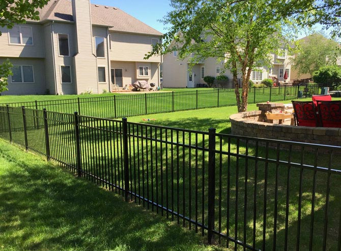 Aluminum fence in noblesville backyard installed by an indianapolis fence company