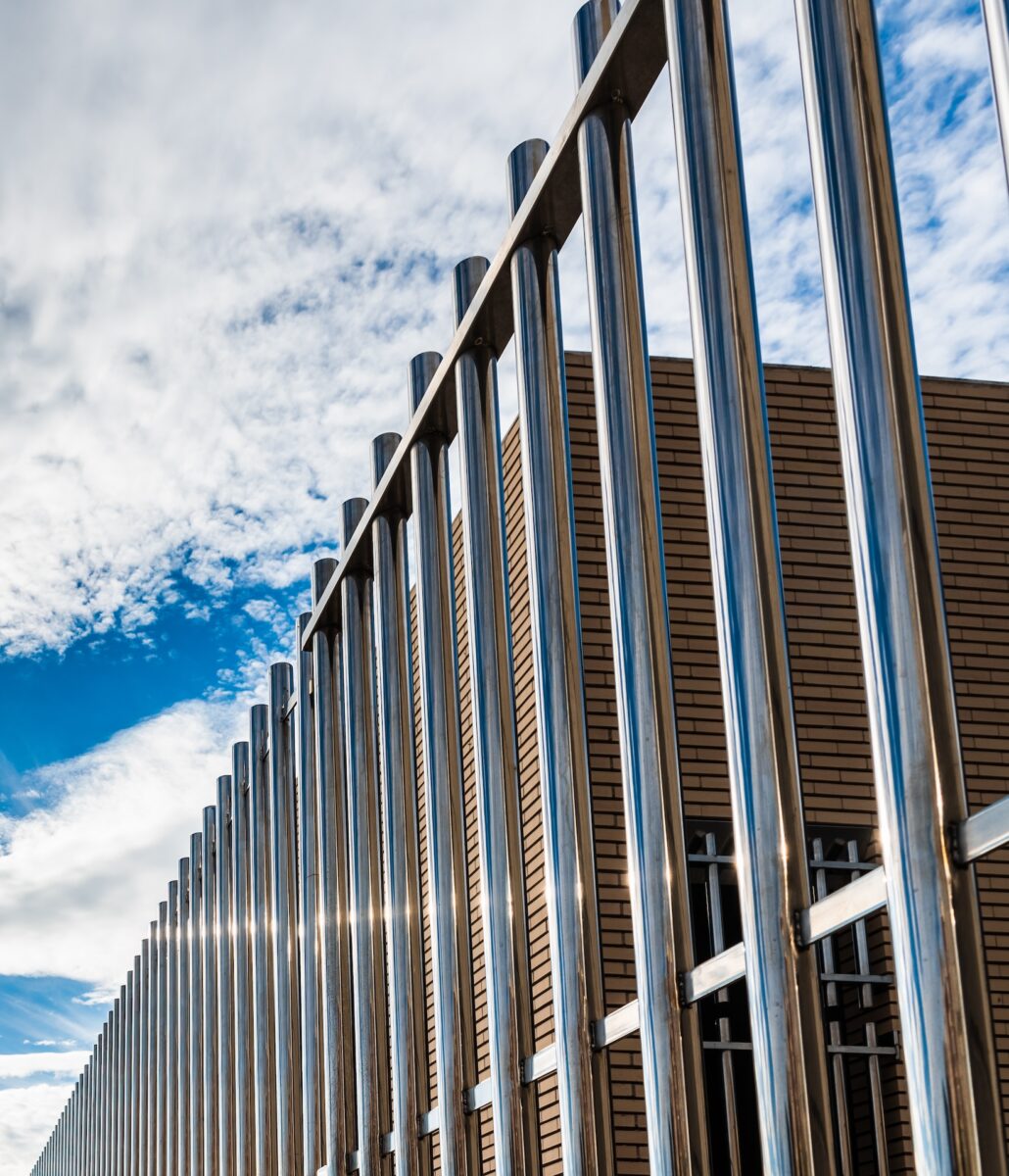 Metal fence around home