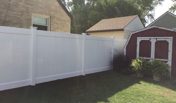 vinyl private fence in carmel indiana backyard, installed by an indianapolis fence company