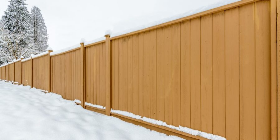 Vinyl fence covered in Indianapolis snow