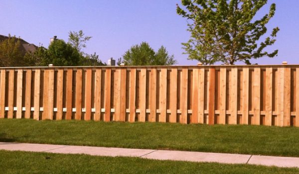 picket wood fence in noblesville indiana backyard. timber ridge fence installs wood picket fences for residents in indianapolis and surrounding areas